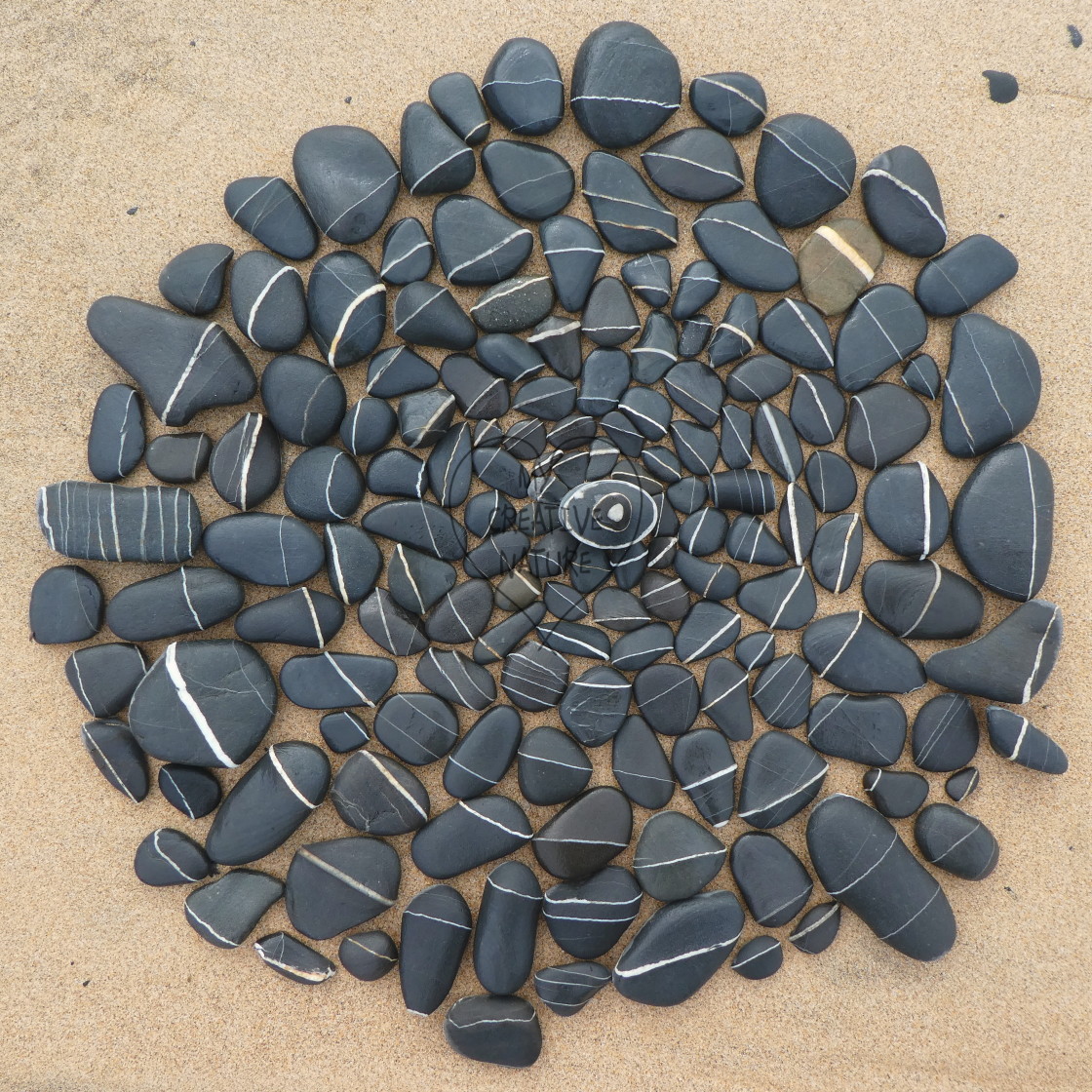 "stone circles from beach pebbles" stock image