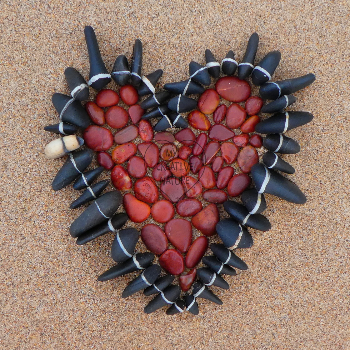 "beach pebble heart print" stock image