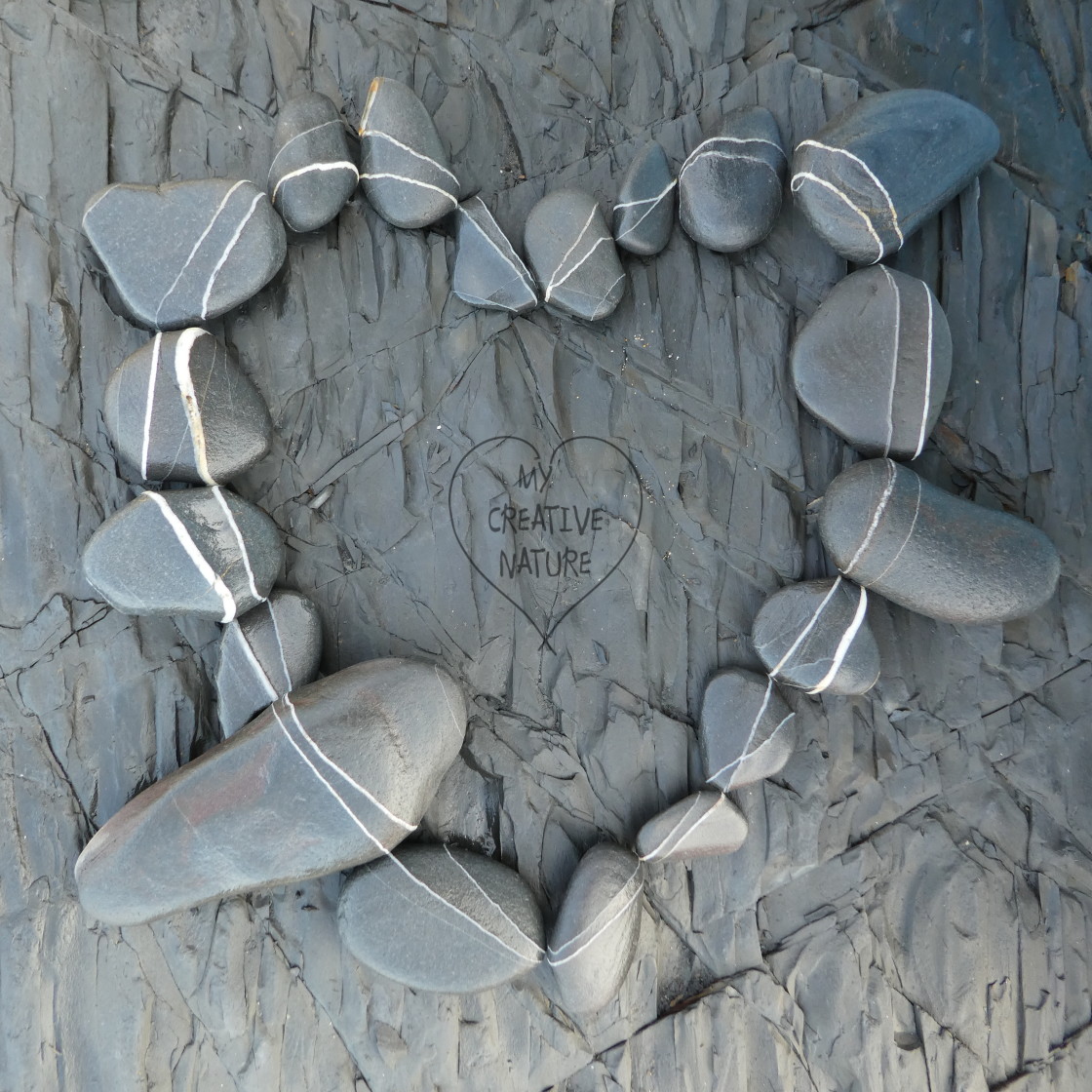 "beach pebble heart print" by Lucia Pec - $12.25 "beach pebble heart print" stock image