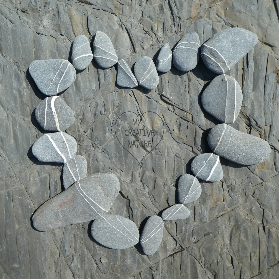 "beach pebble heart print" stock image