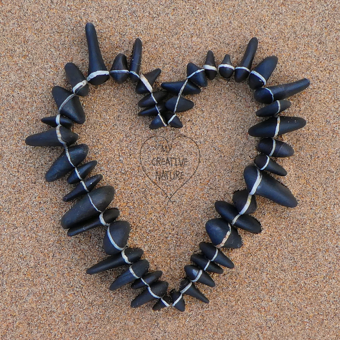 "beach pebble heart print" stock image