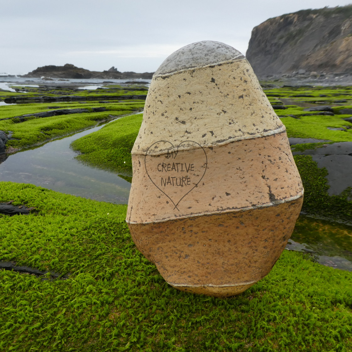 "painted stone beach pebble" by Lucia Pec - $12.25 "painted stone beach pebble" stock image