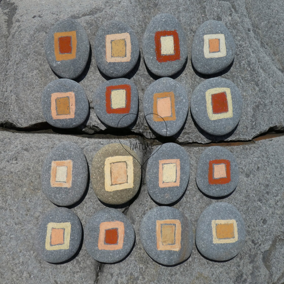 "beach pebbles on a rock painted with stone colors" by Lucia Pec - $12.25 "beach pebbles on a rock painted with stone colors" stock image