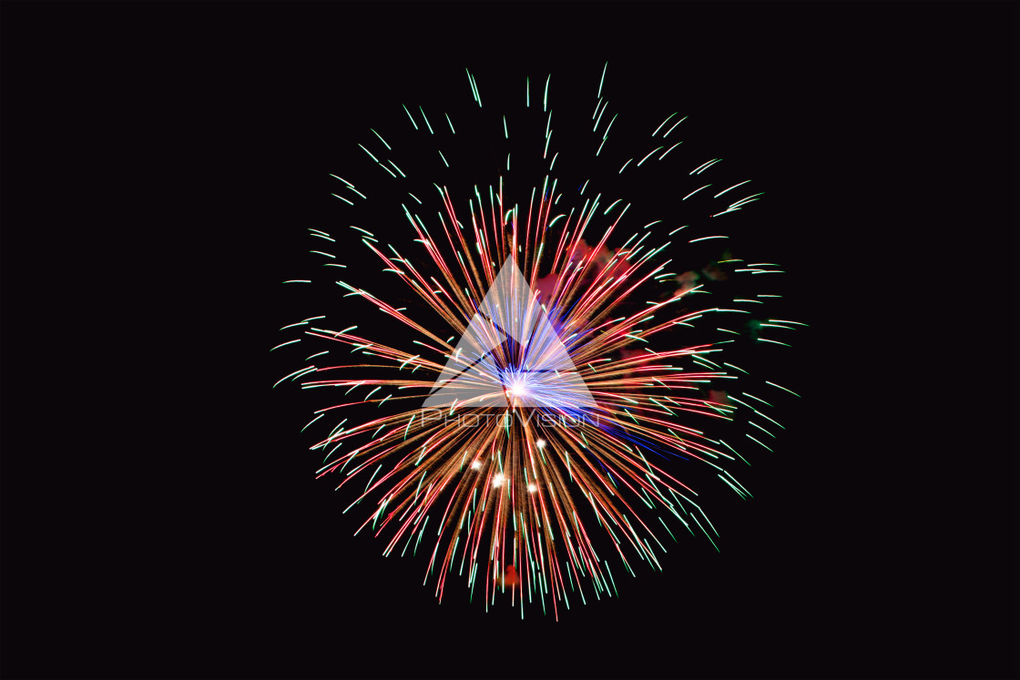 "Colorful firework on the night sky. New Year celebration fireworks. Abstract firework isolated on black background with free space for text" stock image