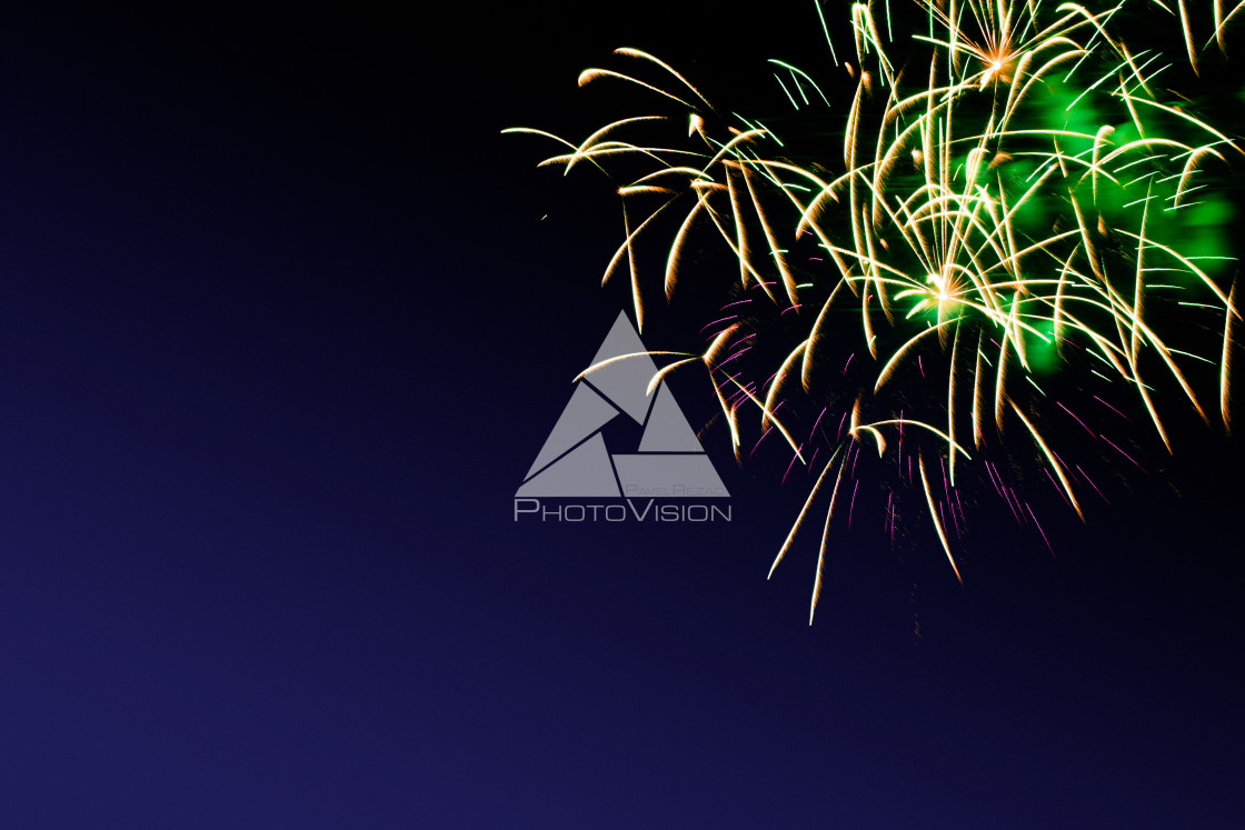 "Colorful firework on the night sky. New Year celebration fireworks. Abstract firework isolated on black background with free space for text" stock image