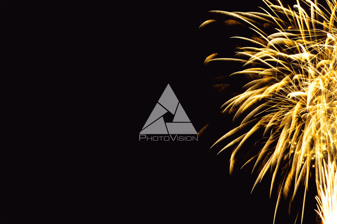 "Colorful firework on the night sky. New Year celebration fireworks. Abstract firework isolated on black background with free space for text" stock image