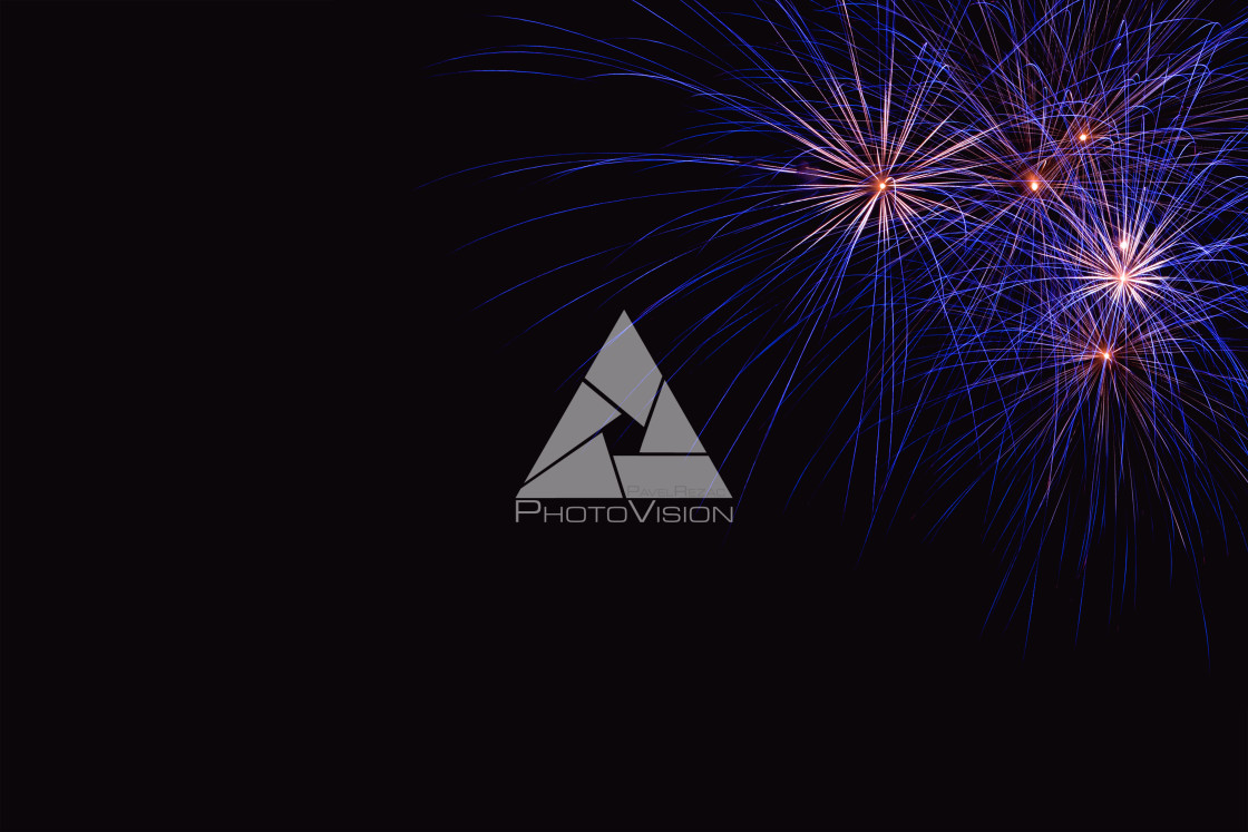 "Colorful firework on the night sky. New Year celebration fireworks. Abstract firework isolated on black background with free space for text" stock image