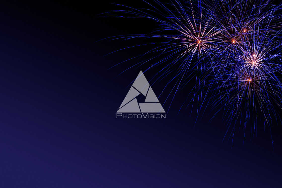 "Colorful firework on the night sky. New Year celebration fireworks. Abstract firework isolated on black background with free space for text" stock image