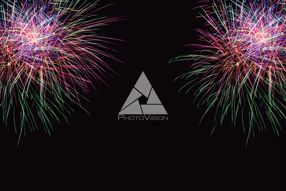 "Colorful firework on the night sky. New Year celebration fireworks. Abstract firework isolated on black background with free space for text" stock image