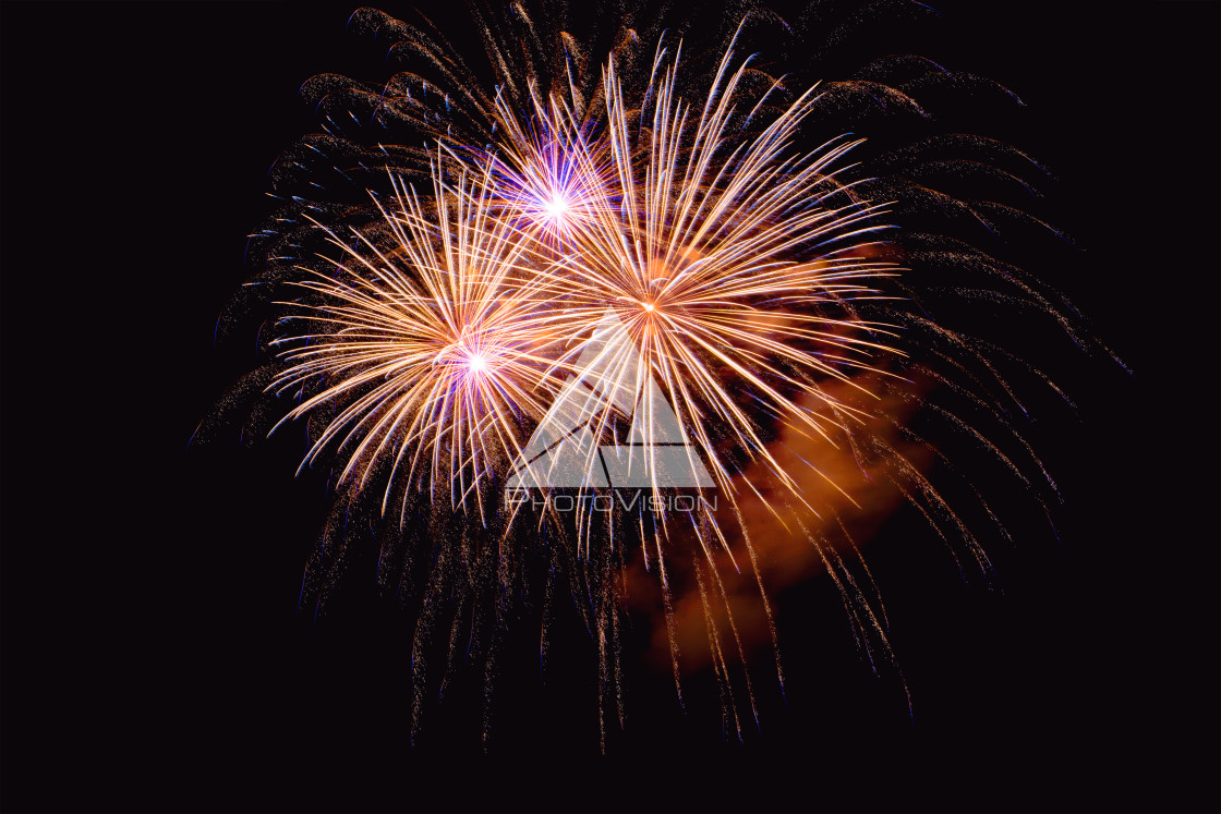 "Colorful firework on the night sky. New Year celebration fireworks. Abstract firework isolated on black background with free space for text" stock image