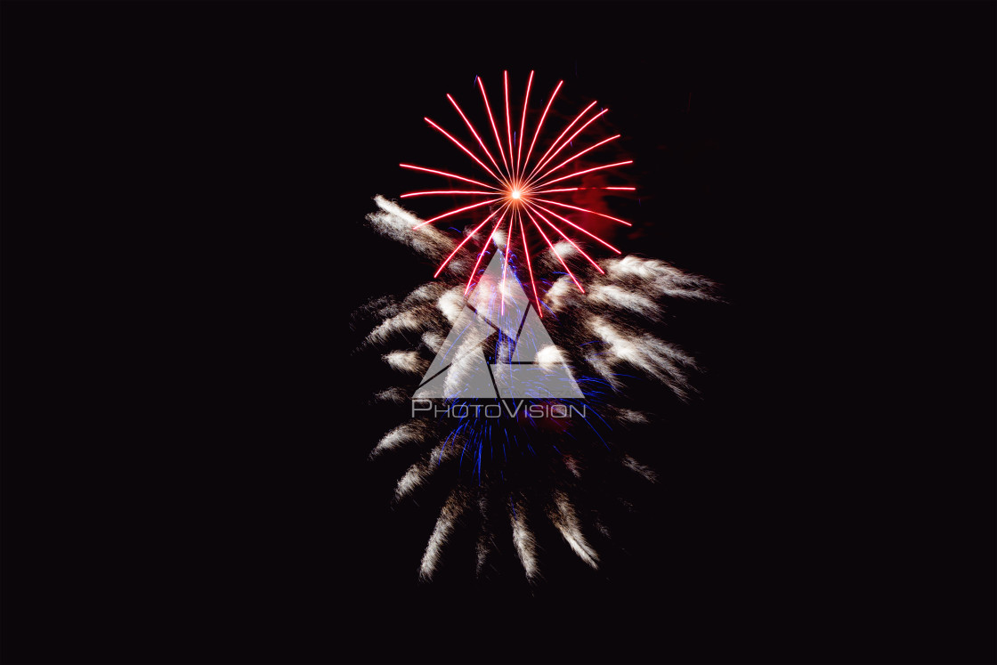 "Colorful firework on the night sky. New Year celebration fireworks. Abstract firework isolated on black background with free space for text" stock image