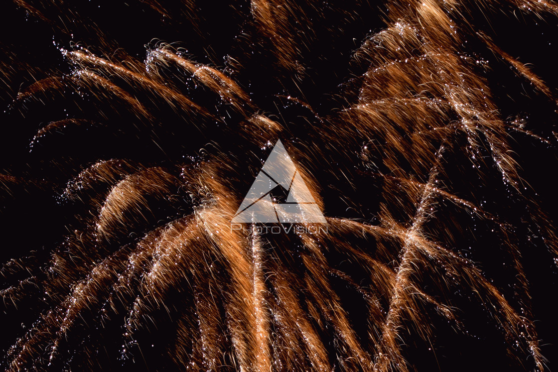 "Colorful firework on the night sky. New Year celebration fireworks. Abstract firework isolated on black background with free space for text" stock image