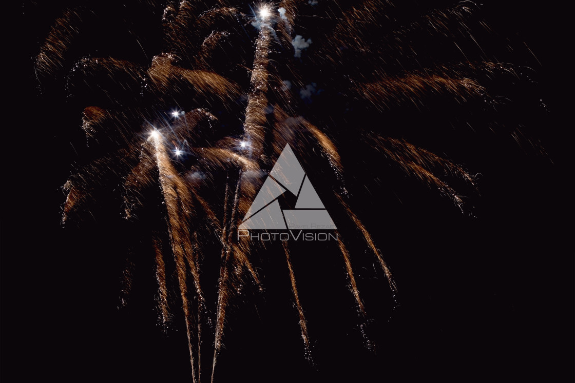 "Colorful firework on the night sky. New Year celebration fireworks. Abstract firework isolated on black background with free space for text" stock image