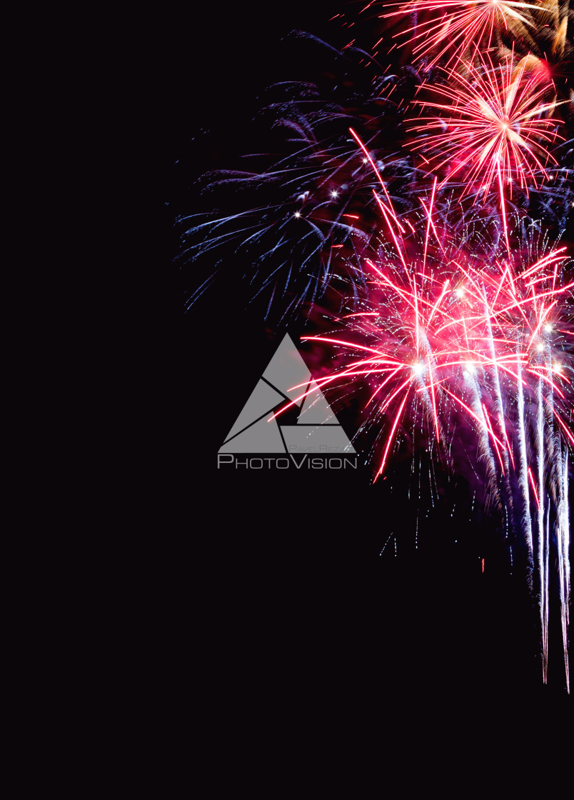 "Colorful firework on the night sky. New Year celebration fireworks. Abstract firework isolated on black background with free space for text" stock image