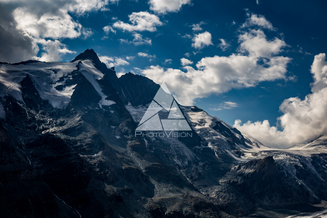 "Dramatic sky in a valley with a mountain Grossglockner" stock image