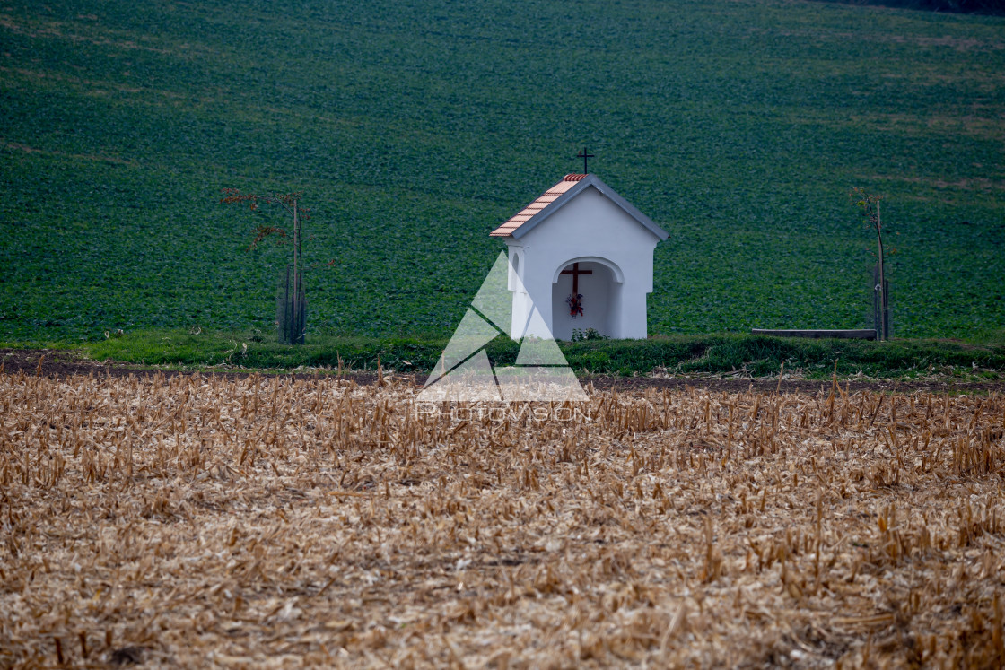 "A small chapel in autumn fields" stock image