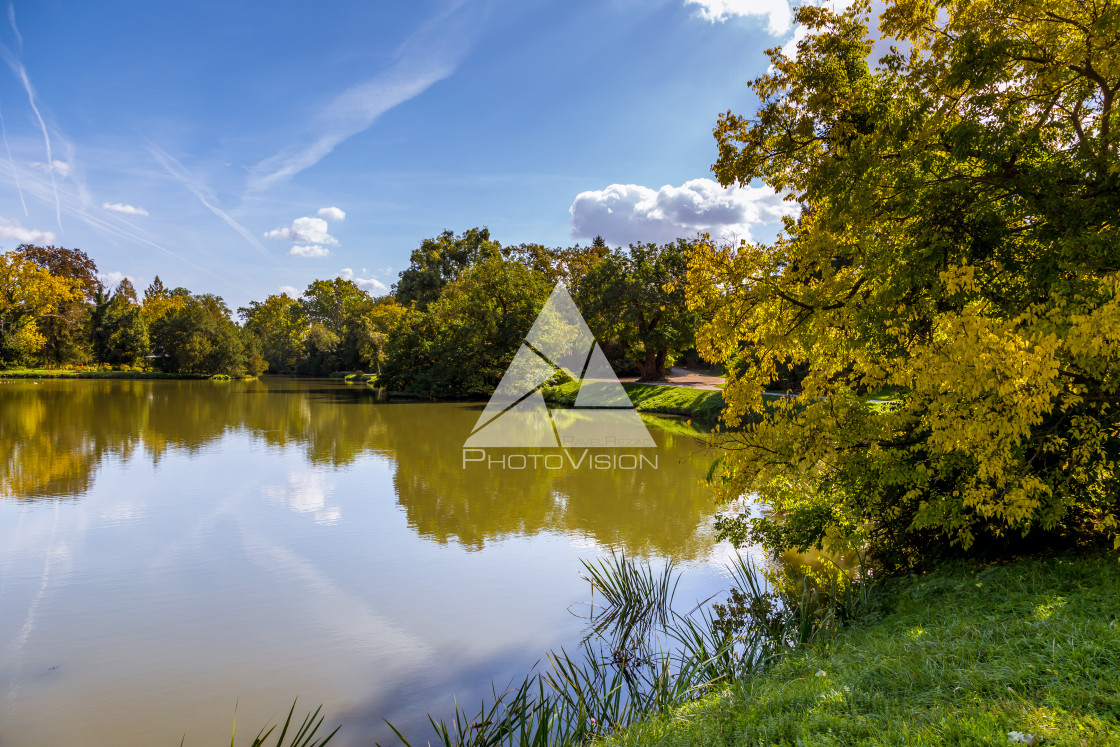 "Lake and trees in Lednice castle park" stock image