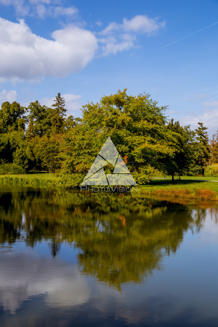 "Lake and trees in Lednice castle park" stock image