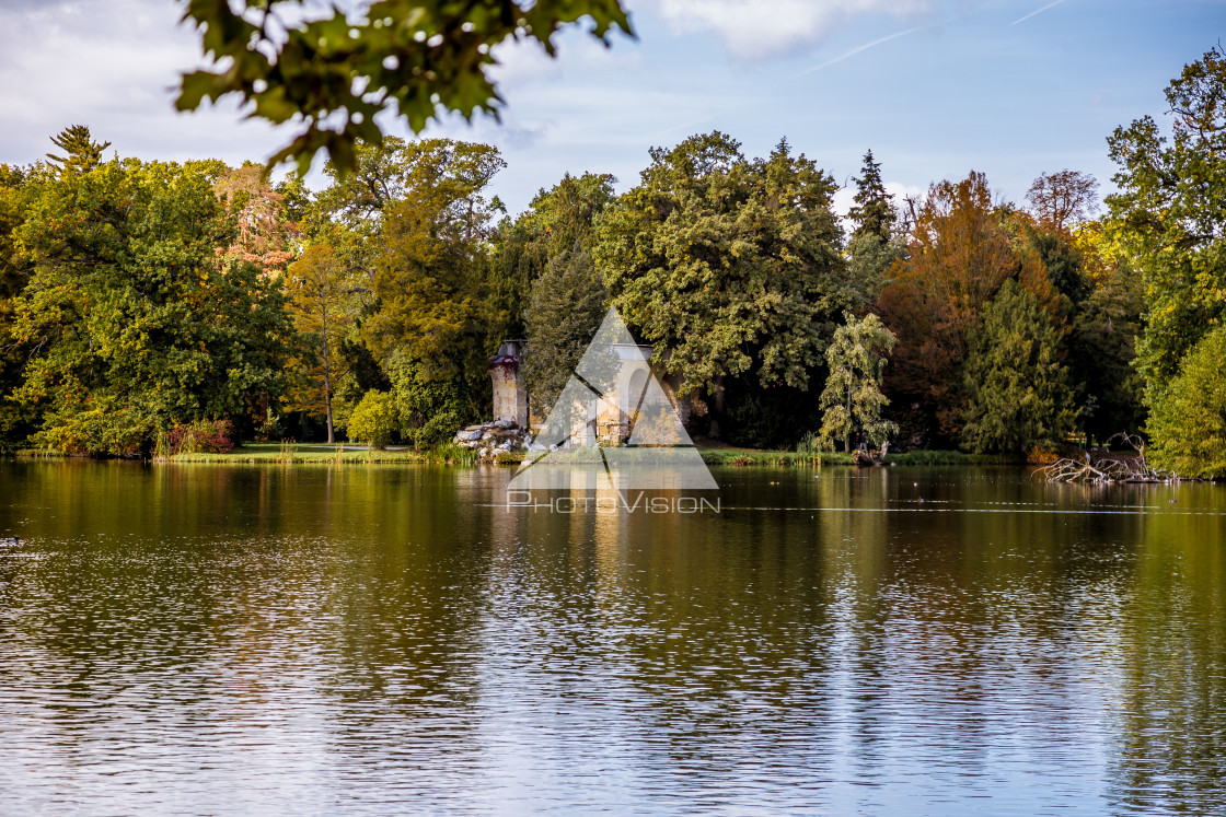 "Lake and trees in Lednice castle park" stock image