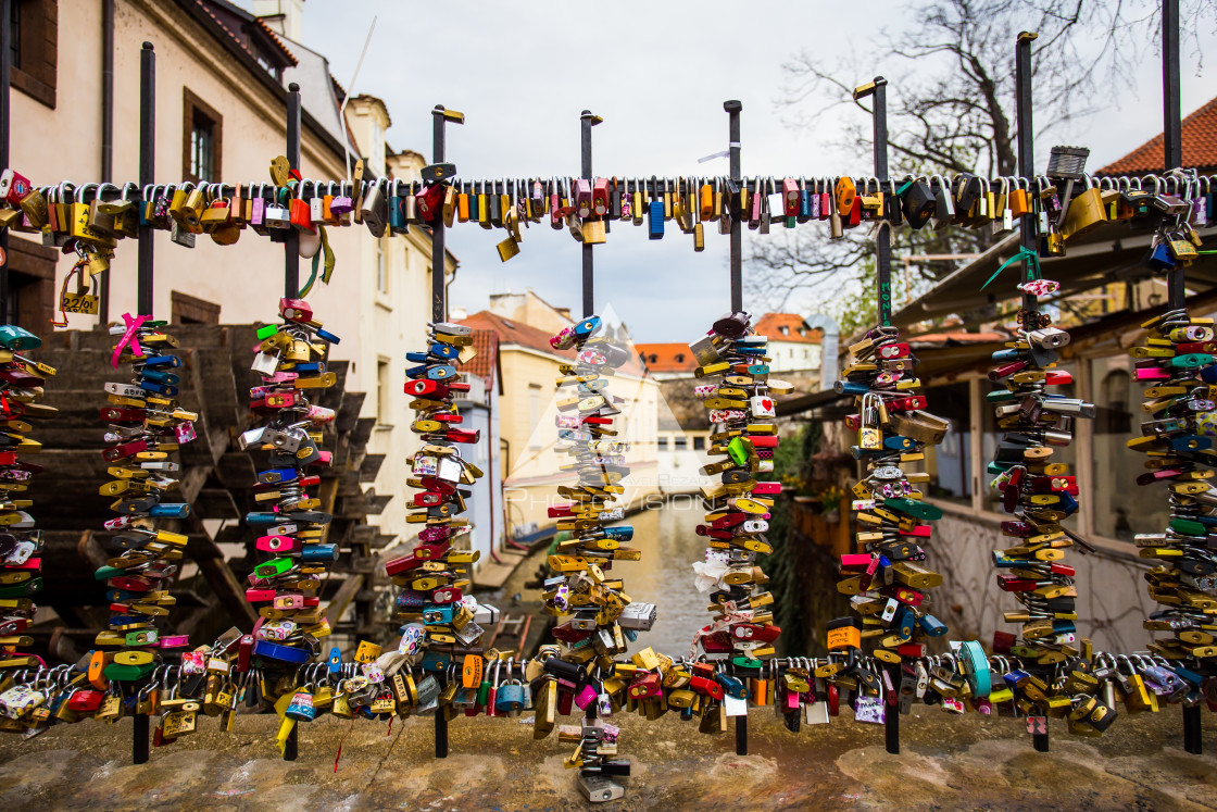 "Love locks on a fence by old water mill on Kampa Island in Pragu" stock image