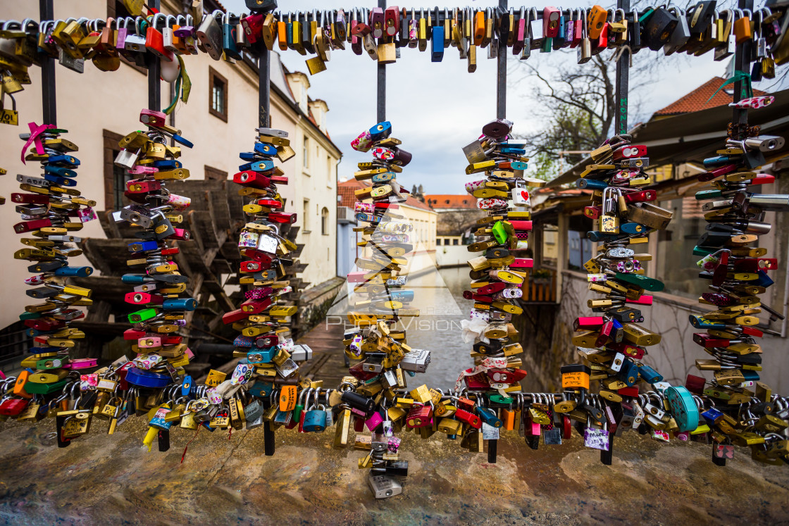 "Love locks on a fence by old water mill on Kampa Island in Pragu" stock image