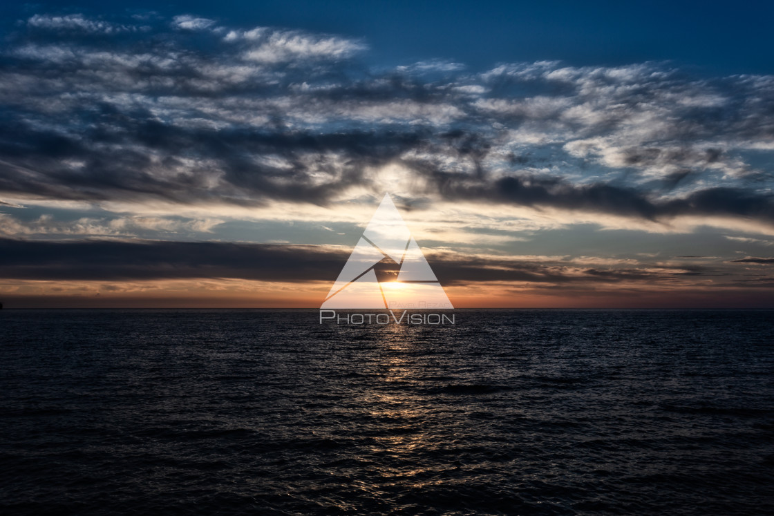 "Beautiful sky with clouds at sunset over Adriatic sea near Peschici town on..." stock image