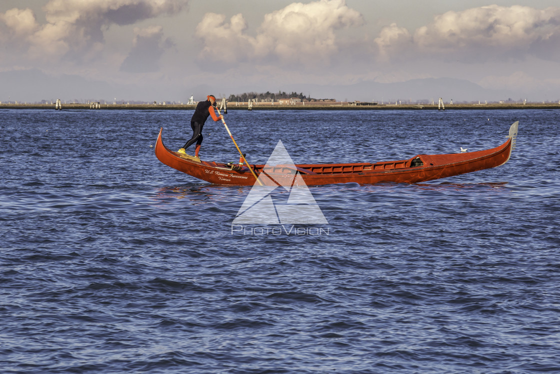 "Gondolier rowing on a gondola" stock image