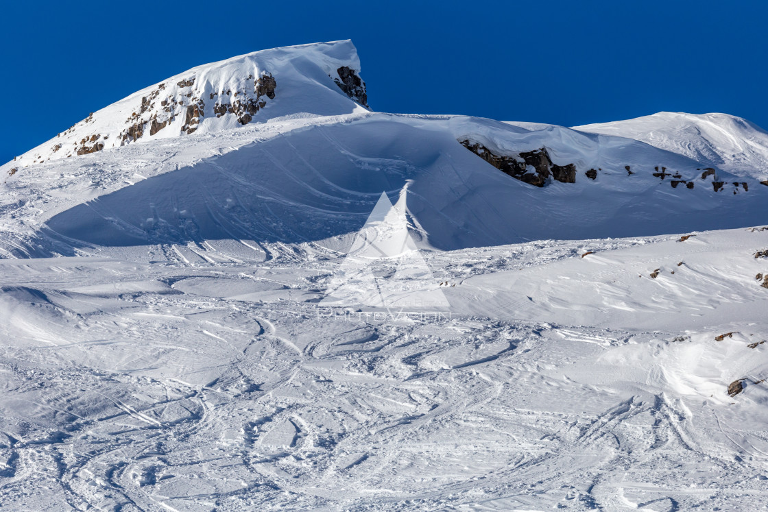 "Painting in snow, arches from skiers in powder snow" stock image