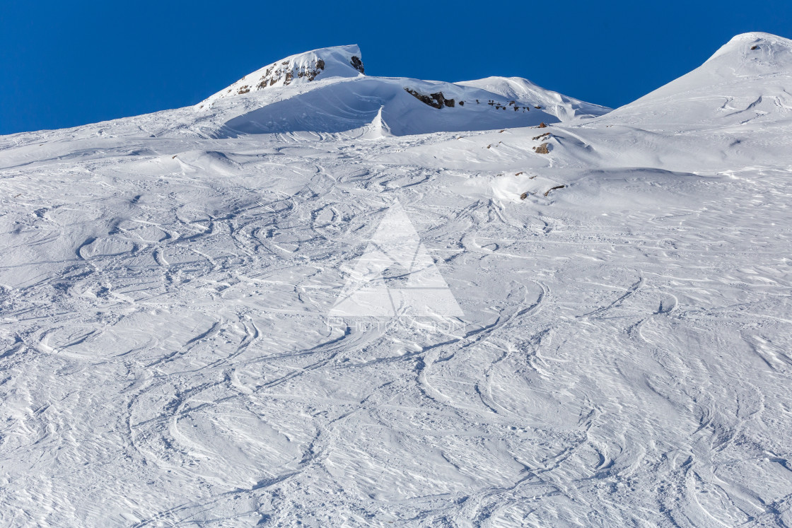 "Painting in snow, arches from skiers in powder snow" stock image