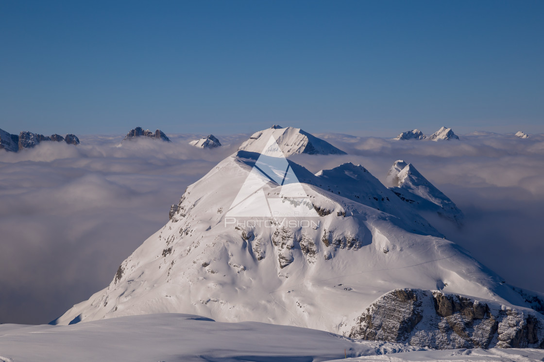 "Panorama of mountains rising from the clouds" stock image