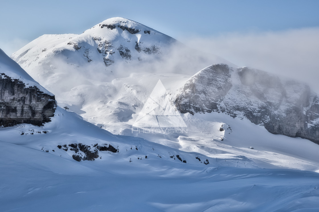 "Clouds between mountains" stock image