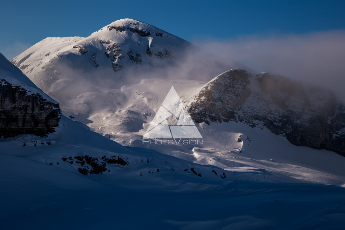 "Clouds between mountains" stock image