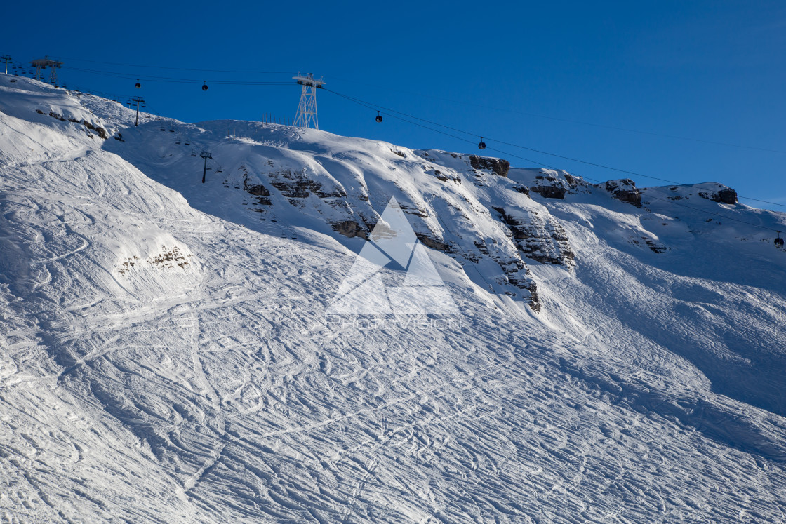 "Mountain peaks with cable cars and ski slopes" stock image