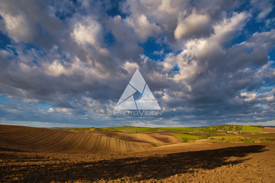 "Flying clouds over landscape" stock image