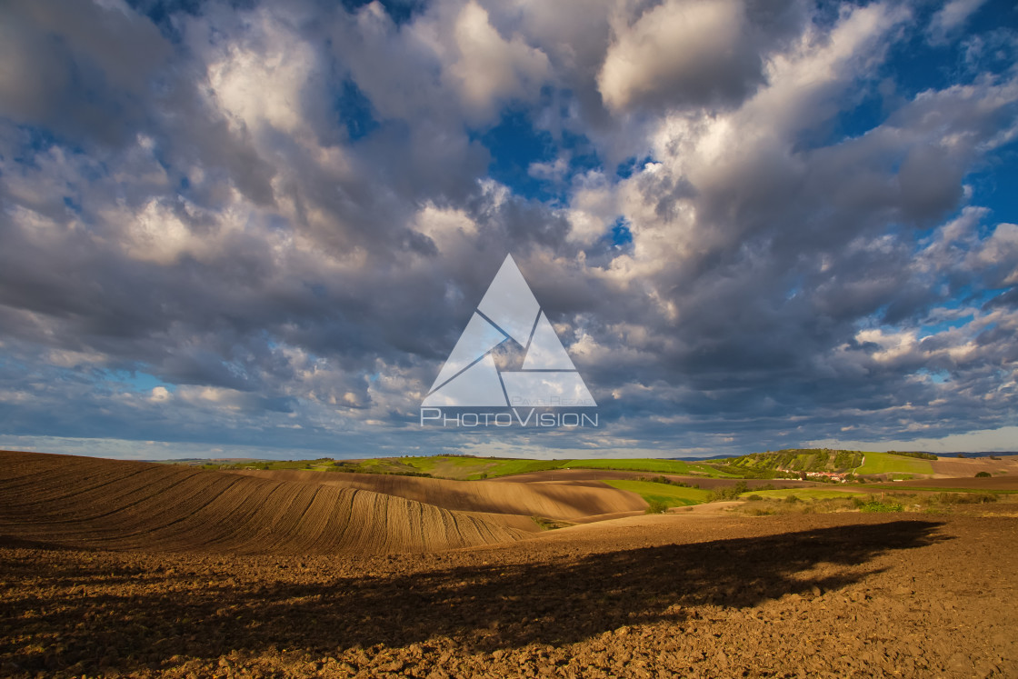 "Flying clouds over landscape" stock image