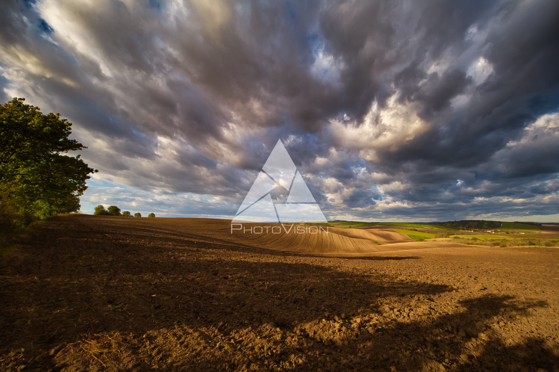 "Autumn field with clouds" stock image