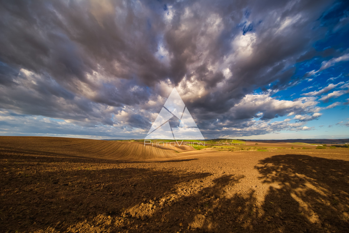 "Autumn field with clouds" stock image