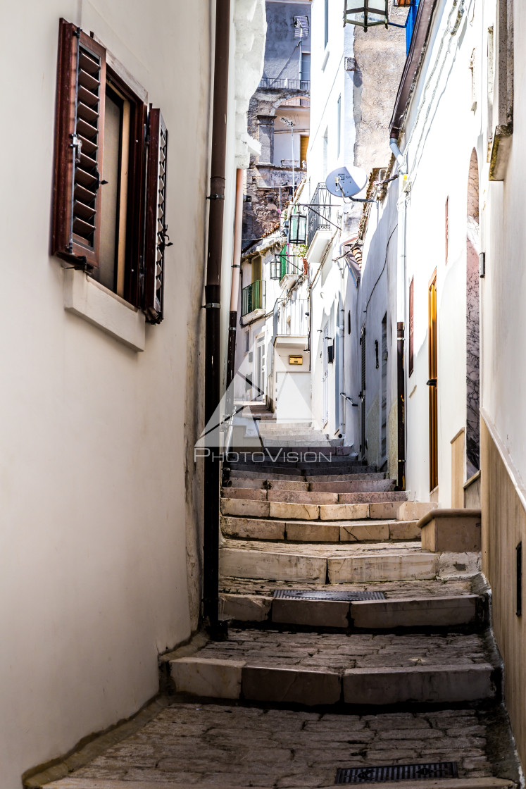 "Narrow streets and stairs lined with white houses" stock image