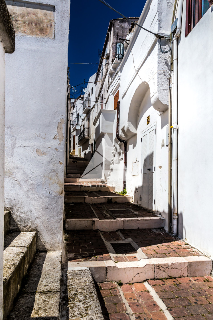 "Narrow streets and stairs lined with white houses" stock image