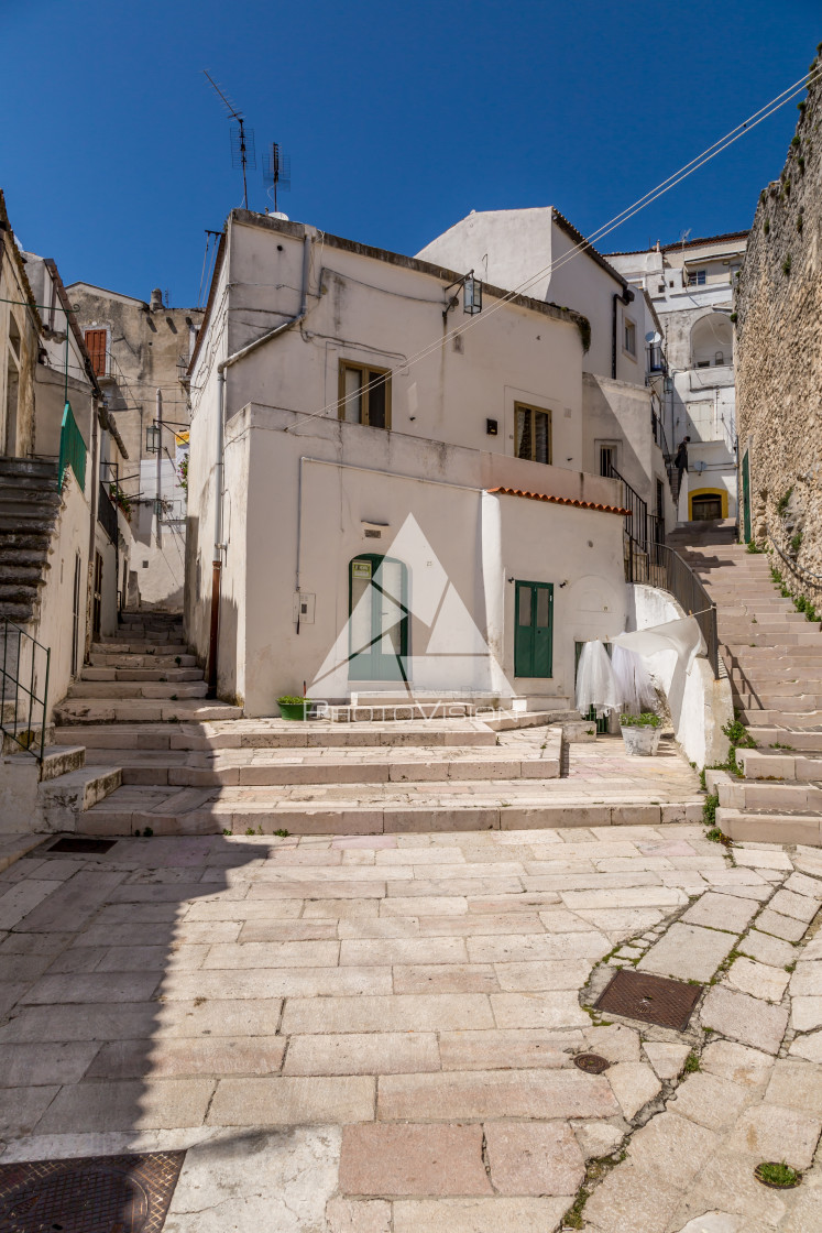 "Narrow streets and stairs lined with white houses" stock image