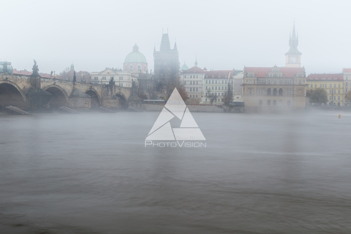 "Fog over the Vltava river near Charles Bridge" stock image