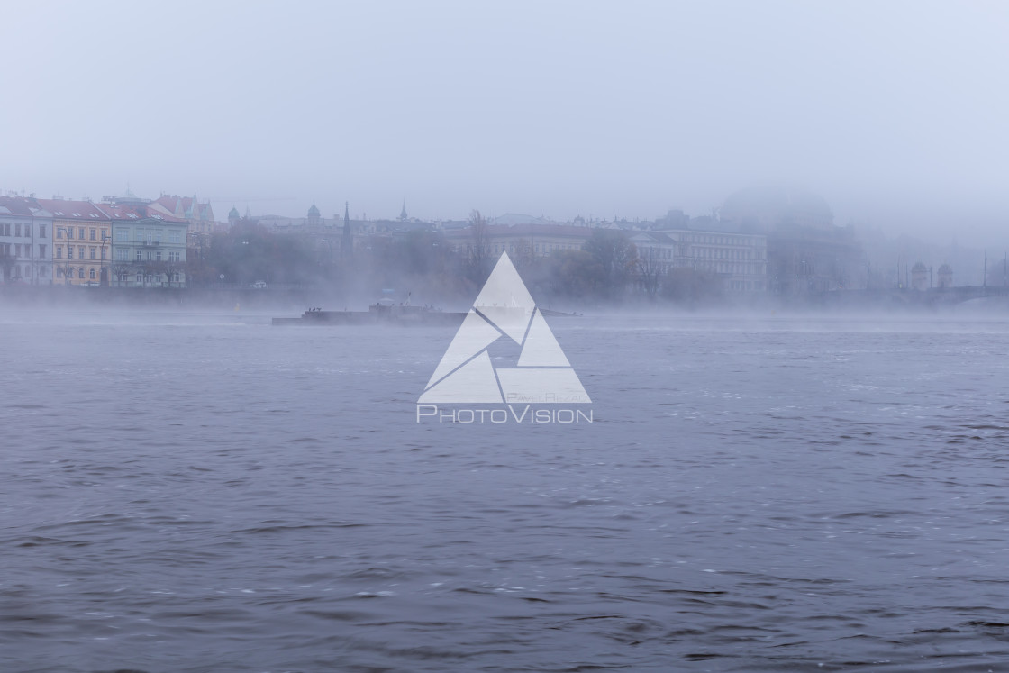 "Fog over the Vltava river near Charles Bridge" stock image