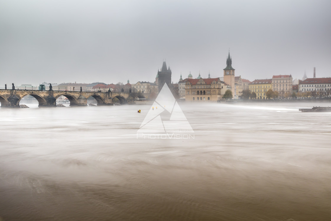 "Fog over the Vltava river near Charles Bridge" stock image