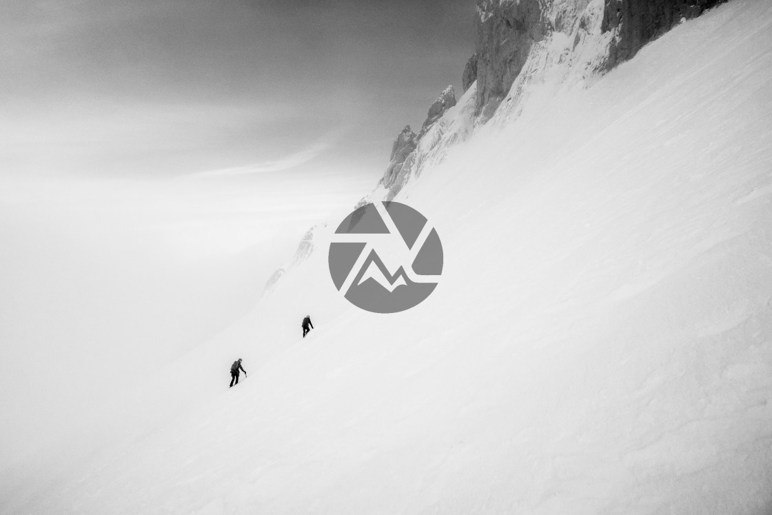 "Mountaineers heading toward their ice & rock gully" by Clément Garaffa Photography - $24.56 "Mountaineers heading toward their ice & rock gully" stock image