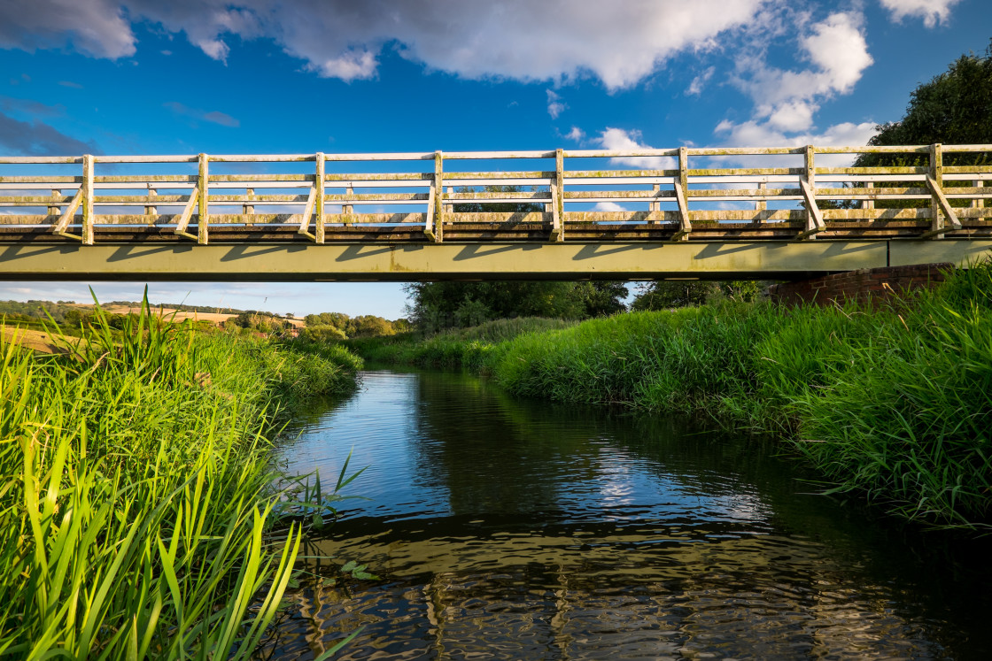 "The white bridge over Cuckmere river." stock image