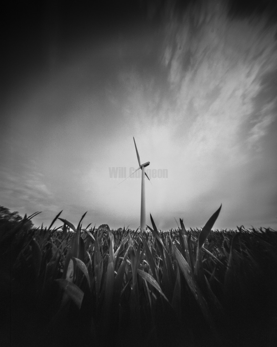 "Lone Wind Turbine - pinhole photo" stock image