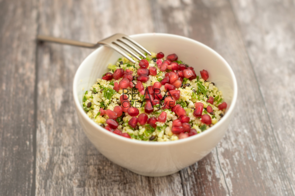 "Pomegranate cauliflower couscous" stock image