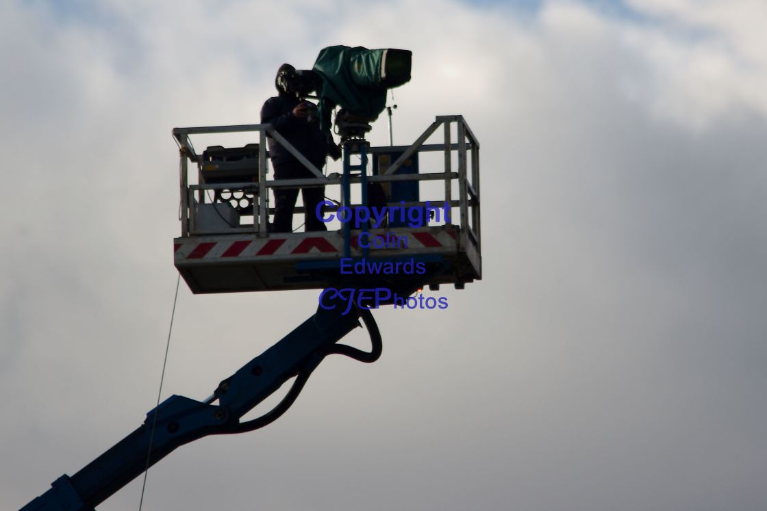 "TV cameraman on high platform" stock image