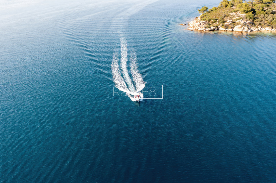 "Motorboat, speed boat navigate on ocean, white wake. Summer vacation, Aegean Sea Greece. Aerial view" by RAWF8 PC - £5.00 "Motorboat, speed boat navigate on ocean, white wake. Summer vacation, Aegean Sea Greece. Aerial view" stock image