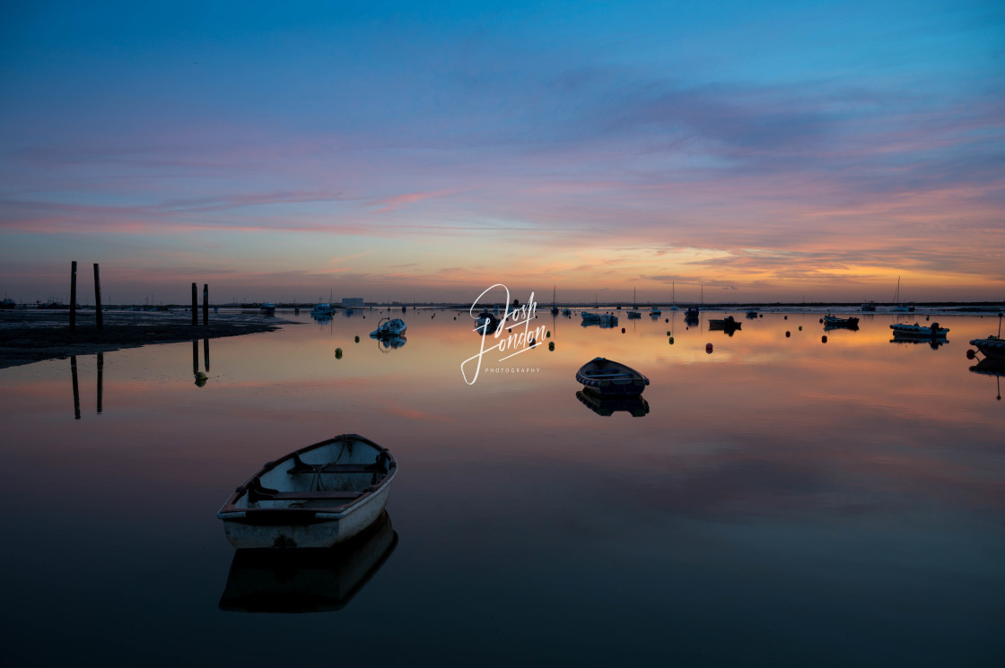 "Mersea island harbour at blue hour" stock image